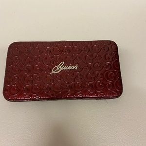 Guess women burgundy hard clutch wallet
